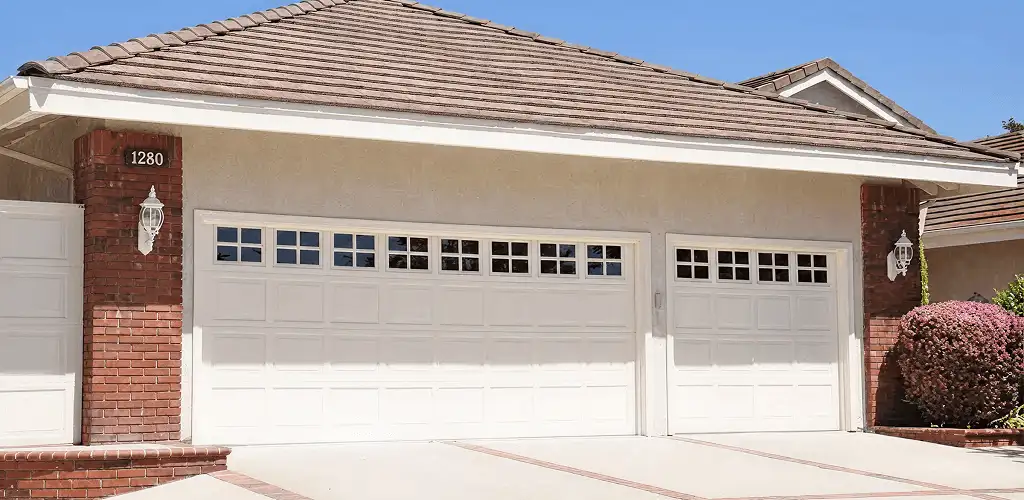 Residential garage door repair service for a double garage door in Grand Rapids, MI
