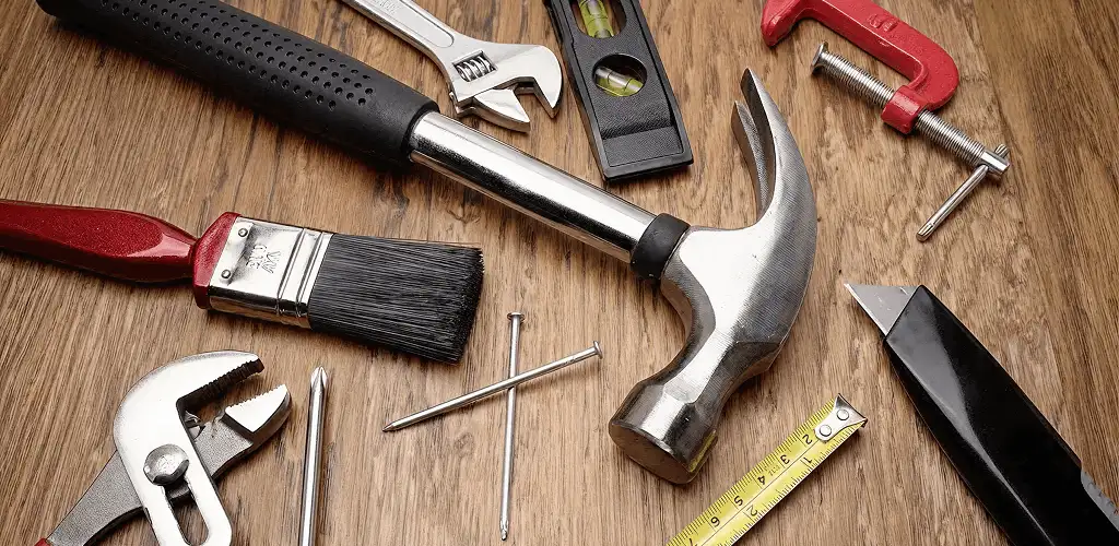 Handyman tools laid out for home repair and maintenance work in Grand Rapids, MI