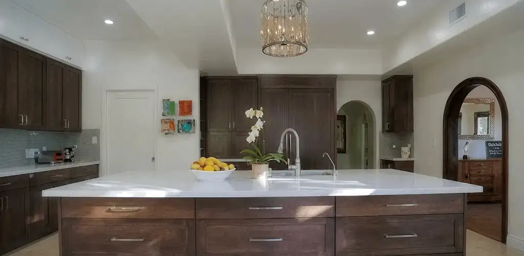 Cabinet refacing project with updated kitchen cabinets and island in Grand Rapids, MI